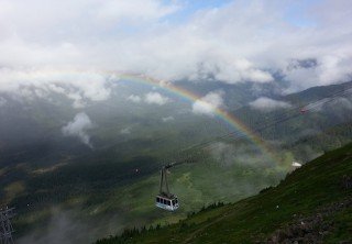 Photo of tram with rainbow